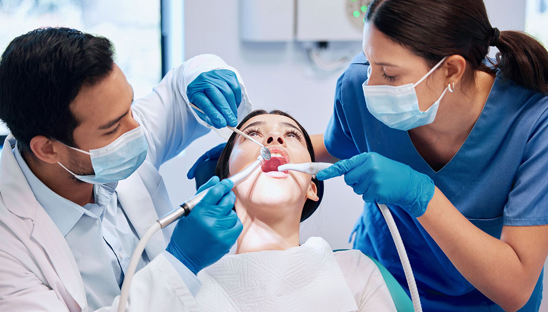 Dental team caring for a patient