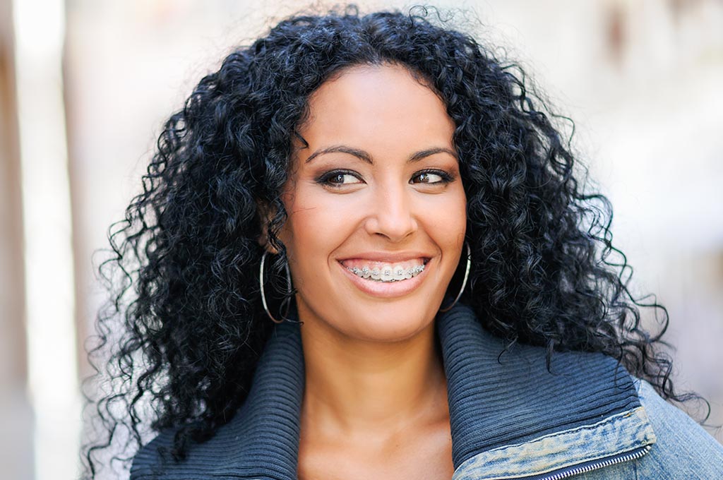 Woman smiling with braces