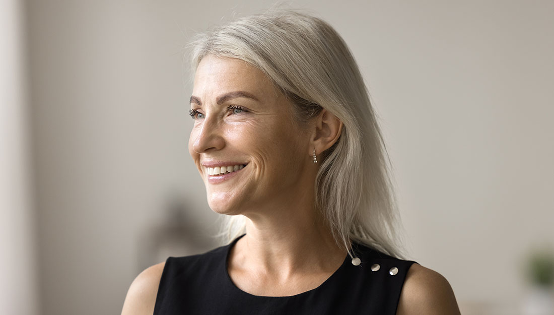 Mature woman smiling confidently